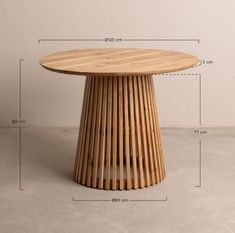 a wooden table sitting on top of a cement floor