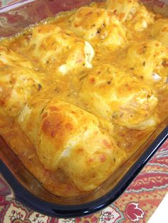 a casserole dish filled with meat and cheese