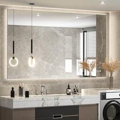 a washer and dryer in a bathroom with marble counter tops, walls and floor