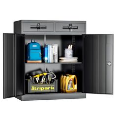 an open metal cabinet with tools and other items on the bottom shelf in front of it