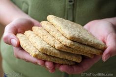 a person is holding some cookies in their hands and it looks like they are ready to eat