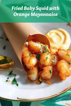 Crispy baby squid served with a tangy orange mayo, an elegant and gourmet Italian finger food ideal for sophisticated events. Orange Mayonnaise, Finger Food Recipes, Baby Squid, Citrus Twist