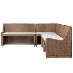 an outdoor wicker couch and table set