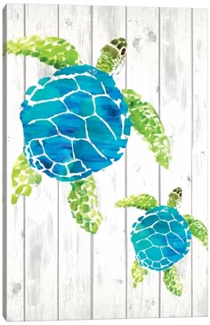 a painting of two sea turtles swimming in the ocean on white wood planks canvas art print