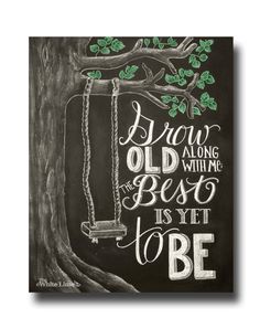 a chalkboard drawing of a tree with a swing hanging from it