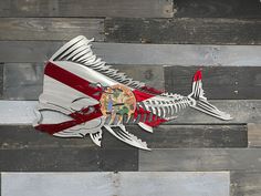 a fish skeleton with the flag of england painted on it