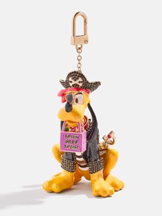 a keychain with a cartoon character holding a sign that says, pirates don't