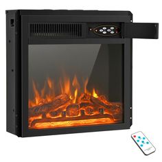 an electric fireplace heater with remote controls on the side and flames in the front