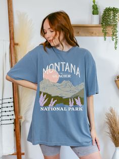 Taking a trip to Glacier National Park will make an impression for a lifetime. Keep the memories alive with this tee printed on Comfort Colors shirts for that garment-dyed vintage look. It also makes a great hiking gift or summer vacation shirt! This is a unisex tee, and we suggest sizing down for a fitted look or sizing up for an oversized tee vibe. Please check our size charts for the perfect fit! ⭐Sign up for our newsletter and get a discount code for 35% off your order! ✔️https://marinstudio Casual Relaxed Fit T-shirt For Outdoor Activities, Casual Short Sleeve T-shirt For Adventure, Spring Outdoor Crew Neck T-shirt, Casual T-shirt For Outdoor Spring Activities, Casual T-shirt For Spring Outdoor Activities, Casual T-shirt For Outdoor Spring Events, Relaxed Fit Short Sleeve T-shirt For Outdoor Activities, Short Sleeve Tops For Outdoor Spring Activities, Short Sleeve Tops For Spring Outdoor Activities