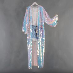 Welcome to my shop, I am in China. It will need around 30 days for international orders. Please consider the time when placing order. Sequin bohemian kimono,perfect for a casual day out. Material: mesh, sequins S size Body width: 27.5 inches(70cm), circle 55 inches(150cm) Shoulder width: 27.5 inches(70cm) Body length:50 inches（127cm） Sleeve length:13 inches（33cm） M size Body width: 31.5 inches(80cm), circle 63 inches(160cm) Shoulder width: 31.5 inches(80cm) Body length:50 inches（127cm） Sleeve le Summer Disco Sequin Dress For Costume Party, Iridescent Sequin Fabric For Spring Party, Spring Party Iridescent Sequin Fabric, Summer Long Sleeve Sequin Dress With Contrast, Contrast Sequin Dress For Summer Costume Party, Glamorous Sequin Fabric For Summer Costume Party, Multicolor Sequin Fabric For Disco In Summer, Spring Disco Sequin Dress, Fitted Sequin Fabric For Festivals