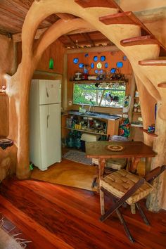 a kitchen and dining area in a tree house