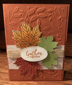 a close up of a card with leaves on it