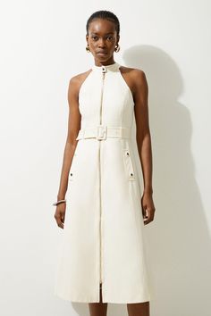 Go Seamlessly From Day To Night In Our Midi Dress, With A Metallic Zip In The Centre, As Well As A Belted Waist For A Cinched Silhouette, And A Long, Full Skirt. Style It With Block Heels Or Ankle Boots For A Look Perfect For Office Days, Then Wear It With Heeled Boots Or Strappy Heels For An Evening Look. Tailored Cotton Belted Halter Neck Full Skirted Midaxi Dress High Quality Cotton Fabric Flattering Fit And Flare Silhouette V Neckline Formal High Neckline Belted Waist Feature Thigh High Leg Bride Jumpsuit, Petite Wedding Guest Dresses, Workwear Capsule Wardrobe, Petite Midi Dress, Spring Wedding Guest Dress, Ibiza Outfits, Honeymoon Outfits, Fall Wedding Guest Dress, Bachelorette Outfits