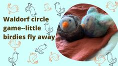 two little birds laying on top of a red blanket next to the words waldor circle game - little birdies fly away