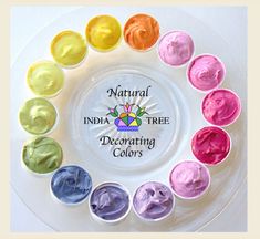 a plate with seven different colors of paint in it and the words, natural india tree decorating colors