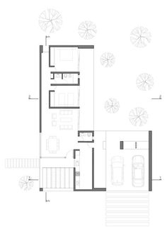 the floor plan for a house with two levels and three cars parked in front of it