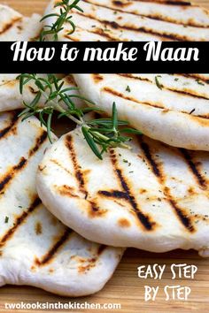 grilled pita breads with herbs on top are ready to be cooked in the oven