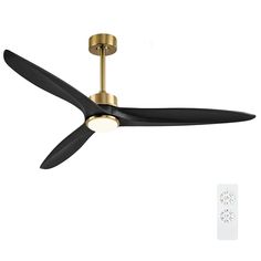 a black and gold ceiling fan with two light bulbs on the blades next to a remote control