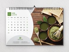 a calendar with green teas and bamboo utensils