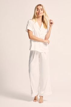 We've heard your requests and we're thrilled to announce that our beloved Toni PJ Set by homebodii is now available in the highly sought-after short sleeve with long pant combination. Introducing the perfect blend of comfort, style, and versatility - your dreams have come true! Crafted from luxurious satin, the Toni PJ Set showcases a lustrous sheen that adds a touch of glamour to your loungewear collection. The short sleeve design provides a breezy and relaxed feel, White Pyjama Set, Luxurious Loungewear, Satin Pyjamas, White Pajamas, Cozy Night, Gentle Touch, Satin Pajamas