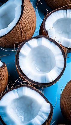 coconuts are shown on a blue surface