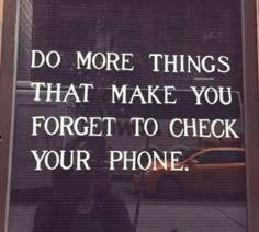 a sign that says do more things that make you forget to check your phone