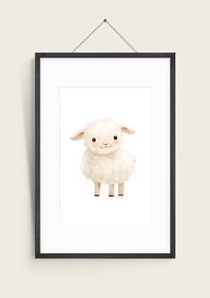 a white sheep with black frame hanging on the wall next to it's shadow