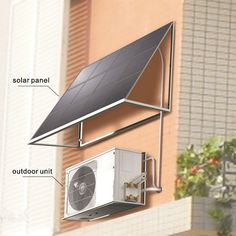 an air conditioner attached to the side of a building with solar panels on it