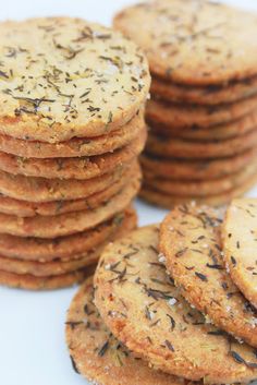 a stack of crackers with sprinkles on them sitting next to each other