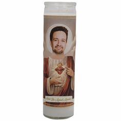 a candle with the image of jesus on it