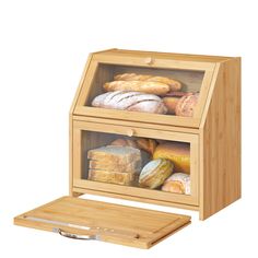 a wooden box filled with different types of bread