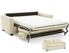 a sofa bed with pull out mattress and chair