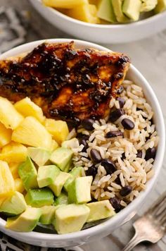 two bowls filled with different types of food