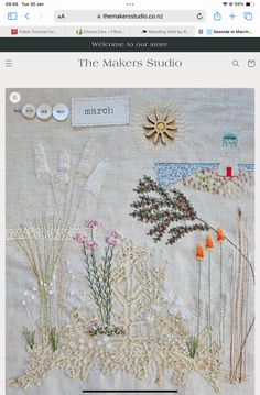 the maker's studio website is displayed on a tabletop with an image of flowers and plants