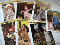 several pictures of dolls are shown on the table