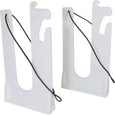 pair of white plastic bookends with black cord attached to each side, set on white background