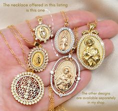 "This listing is for the Oval Mother Mary & Baby Jesus necklace only, shown on its own in the 2nd picture. Other necklaces shown are available separately in my shop. This stunning, large yet extremely delicate pendant, depicts Mother Mary holding Baby Jesus. The 14k gold filled medallion is framed with a row tiny cubic zirconia diamonds and dangles from a shimmering 14K gold filled chain. The back of the pendant has a \"Marian Cross\" - a symbolic representation of the close connection of Mary. Embossed Jewelry, Jesus Necklace, Mary Necklace, Virgin Mary Necklace, Delicate Pendant, Symbolic Representation, Holding Baby, Medallion Necklace, Baby Jesus