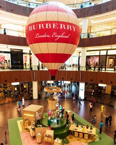 a large hot air balloon in the middle of a mall