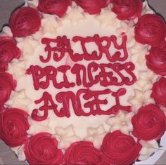 a birthday cake with red roses and the words happy birthday angel written in frosting