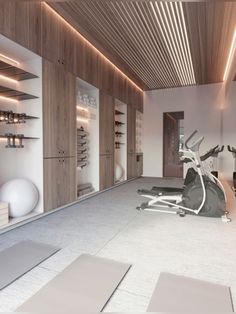 there is a gym with exercise equipment in the room