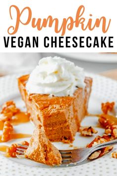 the best ever vegan pumpkin cheesecake on a white plate with a fork in it