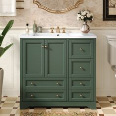 a bathroom with a green cabinet and sink