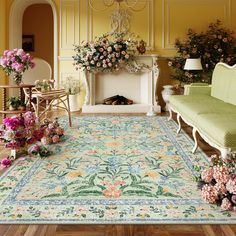 a living room filled with furniture and flowers