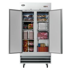 an open refrigerator freezer with food inside