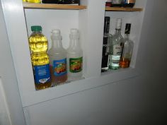 bottles of alcohol are sitting on the shelf