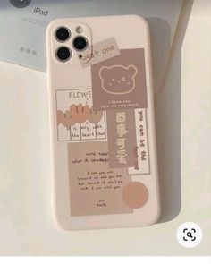 an iphone case with some stickers on it