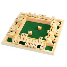 a wooden board game with dices and numbers