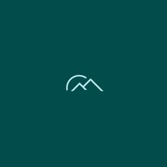 the mountain logo is shown on a dark green background