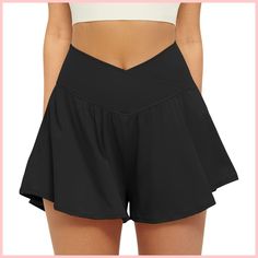 [AffiliateLink] The FireSwan Crossover Athletic Shorts for Women are a versatile and functional choice for any active woman's wardrobe. These shorts feature a 2 in 1 design, with a flowy outer layer and a built-in spandex inner layer, providing both coverage and support during workouts. The addition of pockets adds convenience, allowing for storage of small essentials while on the go. The butterfly design adds a fun and feminine touch, making these shorts suitable for a variety of activities such as running, #womengolfoutfitplussize Flowy Running Shorts, Black Cotton Athletic Shorts With Moisture-wicking, Black Cotton Athletic Shorts With Built-in Shorts, Black Athletic Shorts With Built-in Shorts, Micro-elastic, Black Athletic Shorts With Pockets And 4-way Stretch, Tennis Skort, Active Women