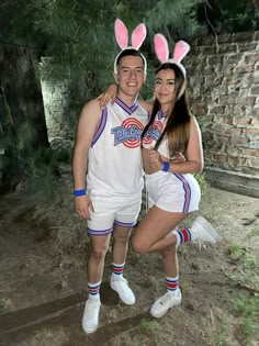 two people in bunny ears posing for a photo